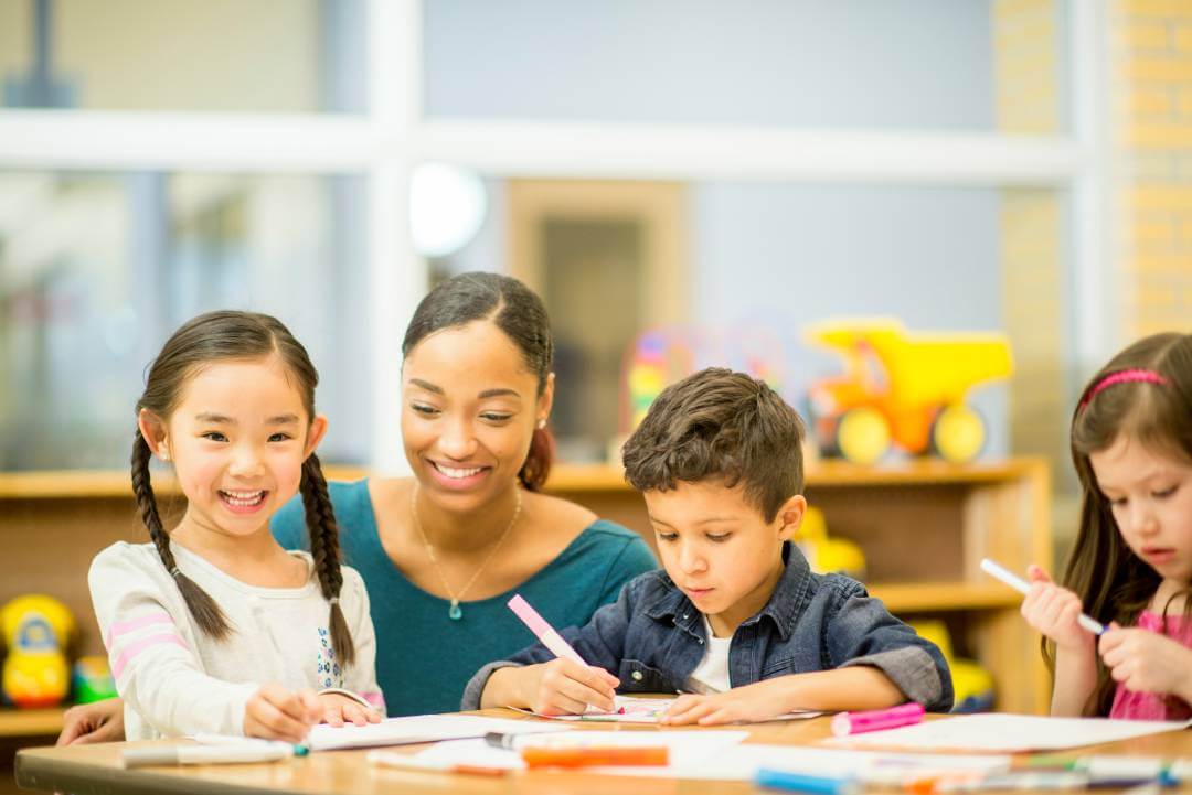 Teacher and kids in classroom